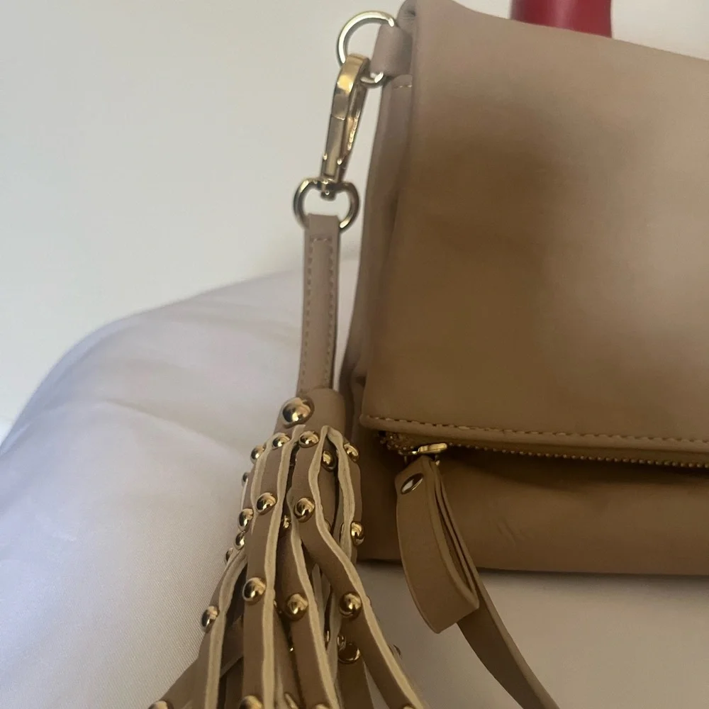 Women’s‎ Charming Charley’s tan fold over clutch bag with tassel detail